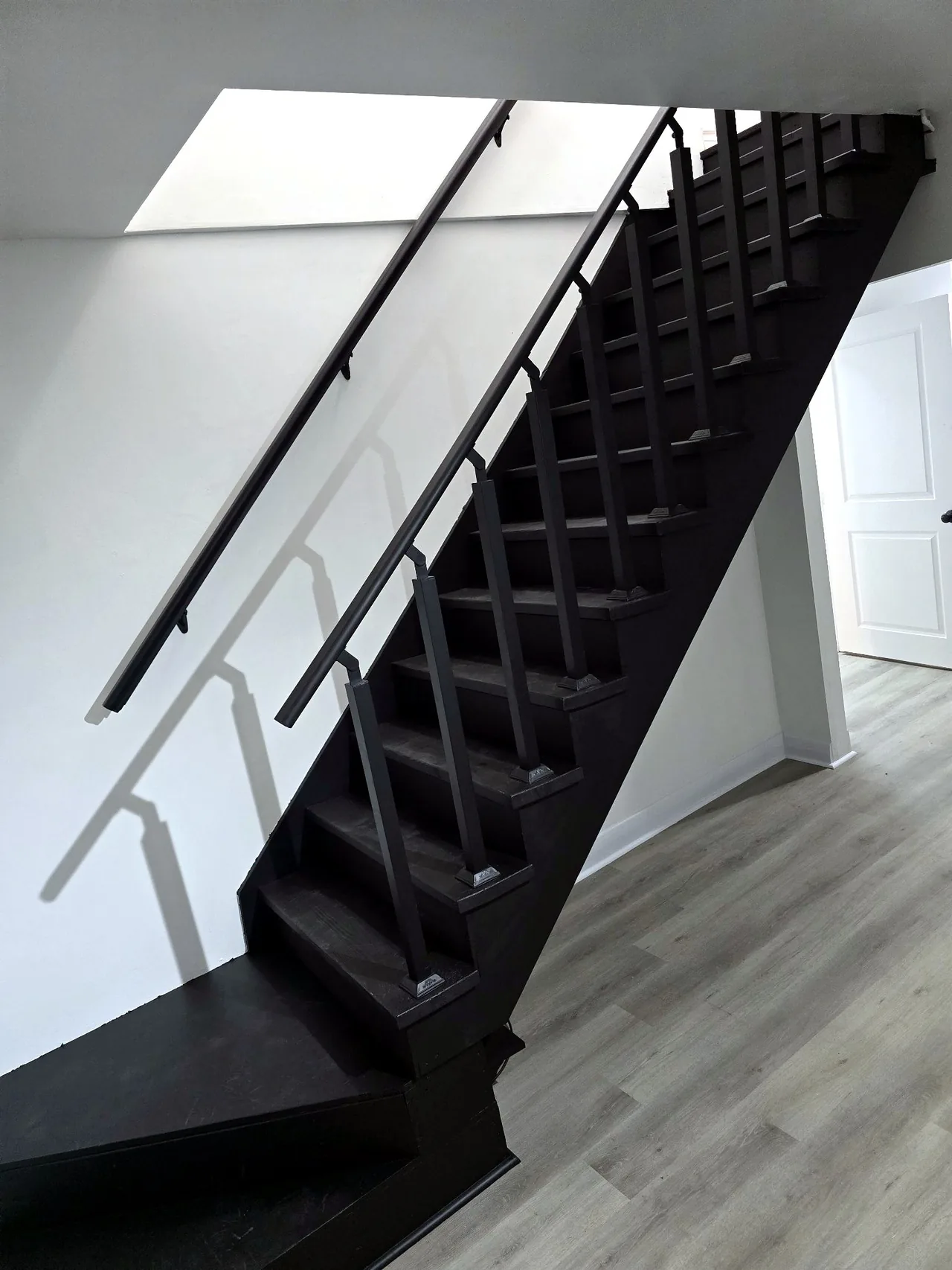 Full Basement Finishing — Staircase Rebuild: after photo 1